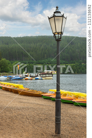 boats on the shores of Lake Titisee boats on the shores of Lake Titisee 112138692