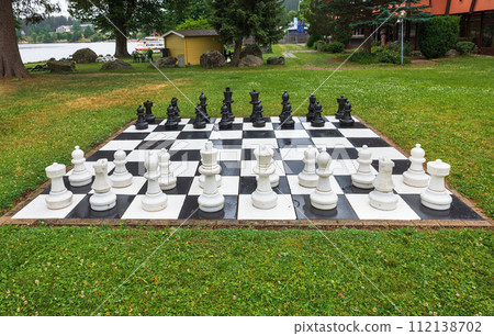 street chess on green grass 112138702