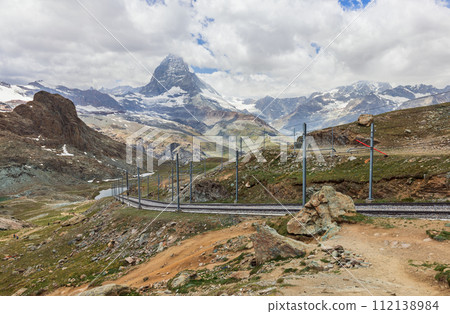 train on the background of the Matterhorn mountain in the Swiss Alps train on the background of the Matterhorn mountain in the Swiss Alps 112138984