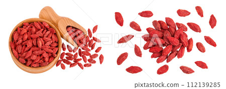 Dried goji berries in wooden bowl and scoop isolated on white background. Top view. Flat lay. 112139285