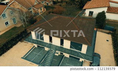 Aerial drone shot of a new generic four apartment house in France 112139379