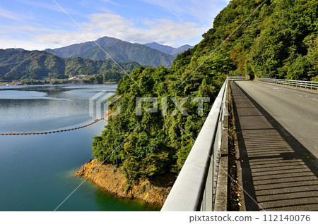 View of the Tanzawa Mountains in autumn from the northern forest road around Lake Miyagase 112140076