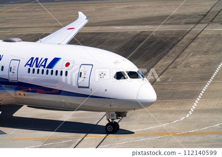 Scenery of Haneda Airport, airplane taxiing, Ota Ward, Tokyo 112140599
