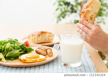 Breakfast image of milk and bread Breakfast image of milk and bread 112142324
