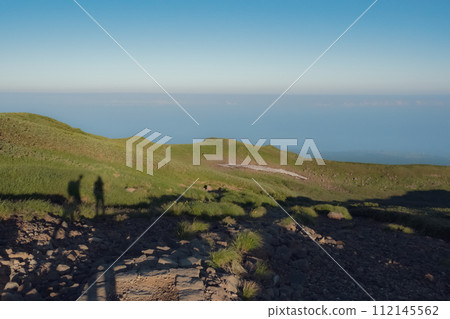 Summer mountain climbing scenery 112145562
