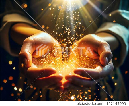 Light overflowing from the palm of your hand 112145993