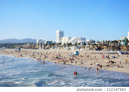 People swimming at a foreign beach 112147363