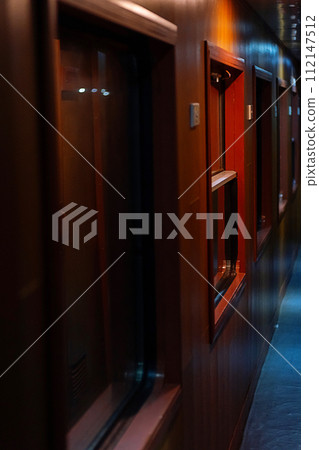 Inside an old sleep wagon of passenger train. Inside an old sleep wagon of passenger train. 112147512