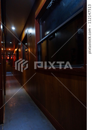 Inside an old sleep wagon of passenger train. Inside an old sleep wagon of passenger train. 112147513