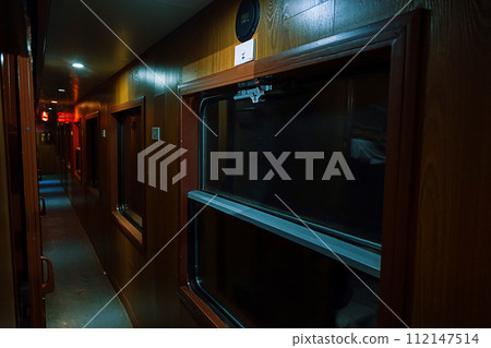 Inside an old sleep wagon of passenger train. Inside an old sleep wagon of passenger train. 112147514