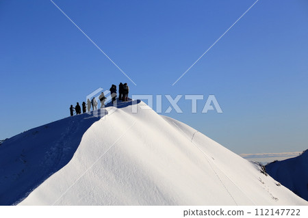 Snowy Mt. Hoki Daisen in Tottori Prefecture with a wide blue sky Snowy Mt. Hoki Daisen in Tottori Prefecture with a wide blue sky 112147722