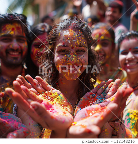 Happy friends having fun with colorful powder dyes 112148216