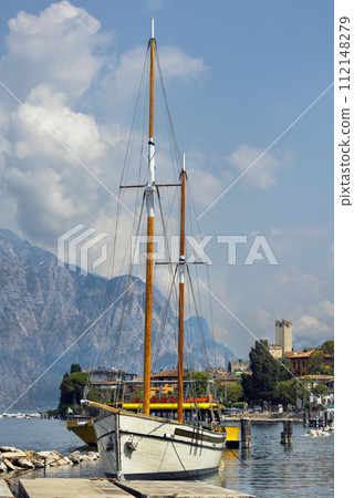 boats and promenade Malcesine on the shores of Lake Garda 112148279