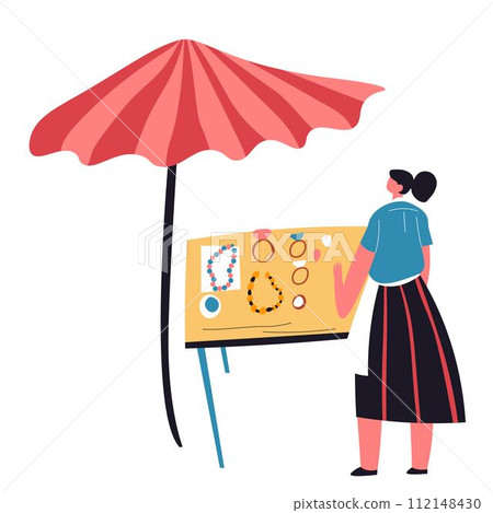 Woman selling jewelry of handmade accessories 112148430