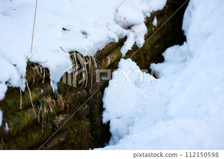 fence hidden by snow fence hidden by snow 112150598