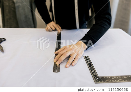 professional tailor hands 112150668