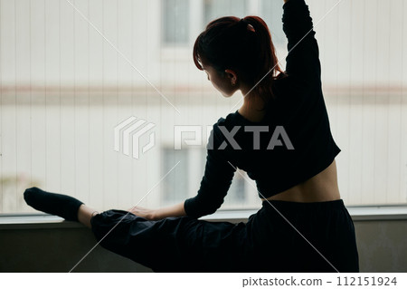 young woman practicing dance young woman practicing dance 112151924