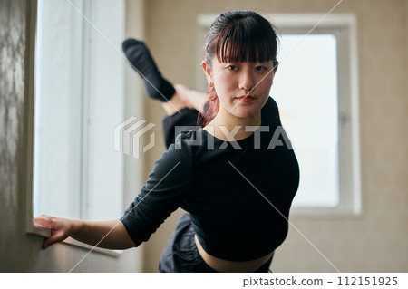 young woman practicing dance young woman practicing dance 112151925