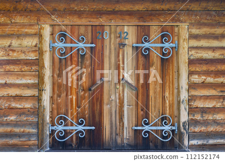 log wall with a double door log wall with a double door 112152174