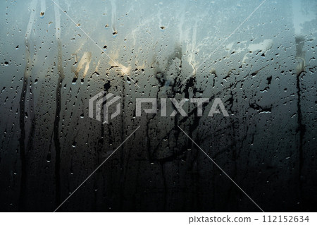 Window Rain, raindrops creating a beautiful, textured surface on a clear window texture background Window Rain, raindrops creating a beautiful, textured surface on a clear window texture background 112152634