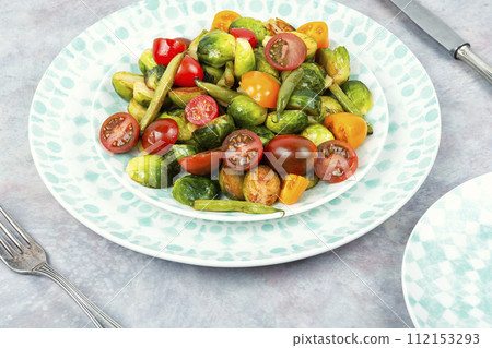 Vegetable salad with fried brussels sprouts. Vegetable salad with fried brussels sprouts. 112153293