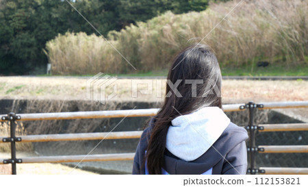 The back of a woman The back of a woman 112153821