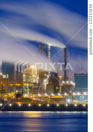 Oil refining. Heavy industry. View of production and factory. View of the factory at night Oil refining. Heavy industry. View of production and factory. View of the factory at night 112153839