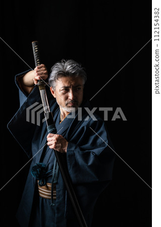 Senior male kimono Japanese sword 112154382