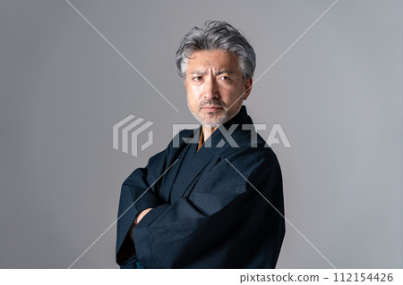 Senior male kimono gray arms folded 112154426
