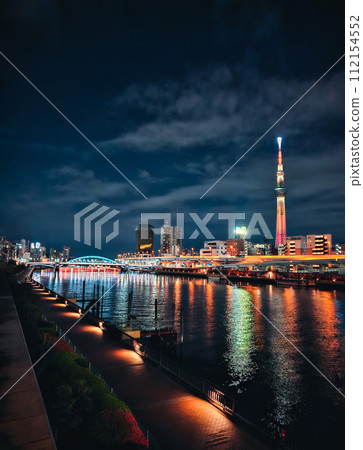 Tokyo Tower At Night Over The Water  112154552