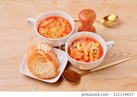 Minestrone, vegetable tomato soup, Italian. Potatoes, onions, cabbage, bacon, macaroni Minestrone, vegetable tomato soup, Italian. Potatoes, onions, cabbage, bacon, macaroni 112154657