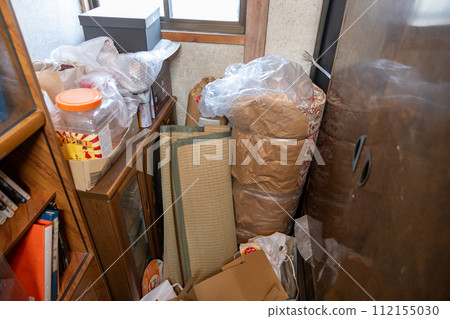 A storage room where the belongings of the family home are being sorted out A storage room where the belongings of the family home are being sorted out 112155030
