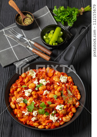 greek giant baked beans with feta on pan greek giant baked beans with feta on pan 112155679