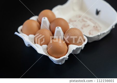 Fresh eggs in a paper pack Fresh eggs in a paper pack 112156601