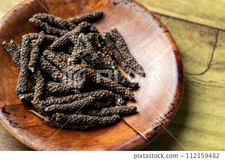 Dried long pepper Dried long pepper 112159482