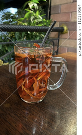 A glass of Wedang Uwuh from Indonesia 112159564