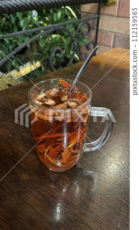 A glass of Wedang Uwuh from Indonesia 112159565
