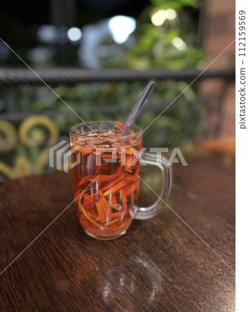 A glass of Wedang Uwuh from Indonesia 112159569