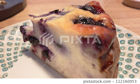 Yogurt cake with rum raisins 112160953