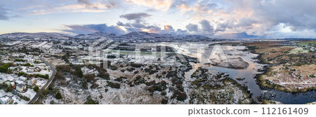 Aerial view of a snow covered Ardara in County Donegal - Ireland 112161409