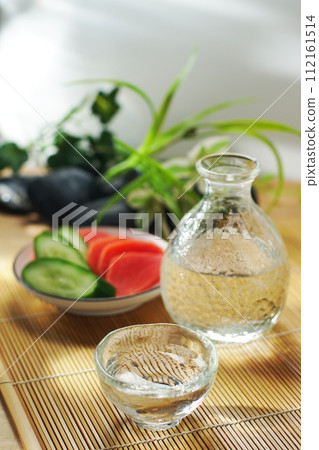Japanese sake, pickled cucumber and red turnip Japanese sake, pickled cucumber and red turnip 112161514