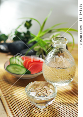Japanese sake, pickled cucumber and red turnip Japanese sake, pickled cucumber and red turnip 112161515