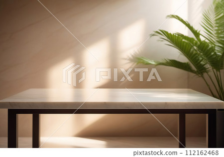 Empty blank marble tabletop on a beige wall, beautiful floral tropical shadow. Minimalistic backdrop for product presentation, podium, pedestal. Showcase, display case. Minimal abstract background. 112162468