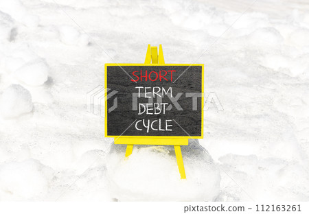 Short term debt cycle symbol. Concept words Short term debt cycle on beautiful black chalk blackboard. Beautiful white snow background. Business Short term debt cycle concept. Copy space Short term debt cycle symbol. Concept words Short term debt cycle on beautiful black chalk blackboard. Beautiful white snow background. Business Short term debt cycle concept. Copy space 112163261