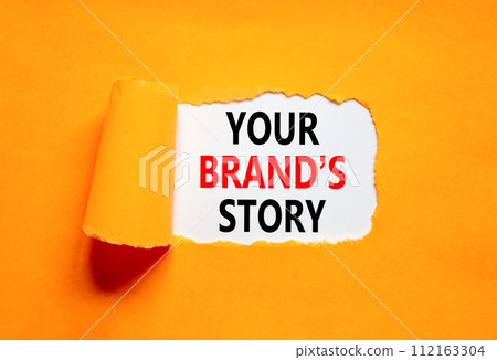 Branding and your brand story symbol. Concept words Your brands story on beautiful white paper. Beautiful orange paper background. Business branding your brand story concept. Copy space. 112163304