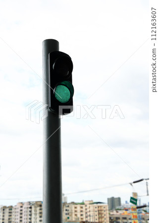 Green traffic light signal in the railway station. Green traffic light signal in the railway station. 112163607
