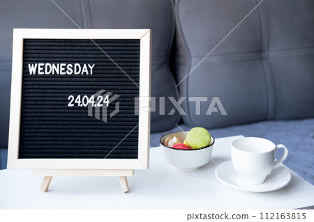 Beautiful date for a wedding 04/24/2024 on a black letterboard on the table 112163815