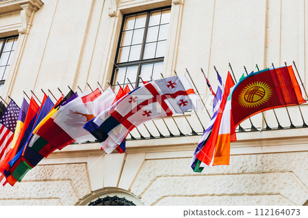 National flags of various countries flying in the wind. Colorful flags from different countries. Flags Organization for Security and Co-operation in Europe National flags of various countries flying in the wind. Colorful flags from different countries. Flags Organization for Security and Co-operation in Europe 112164073
