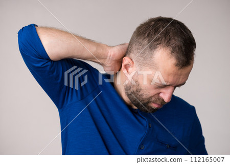 Man having neck ache Man having neck ache 112165007