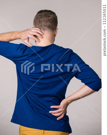 Man having neck ache Man having neck ache 112165011